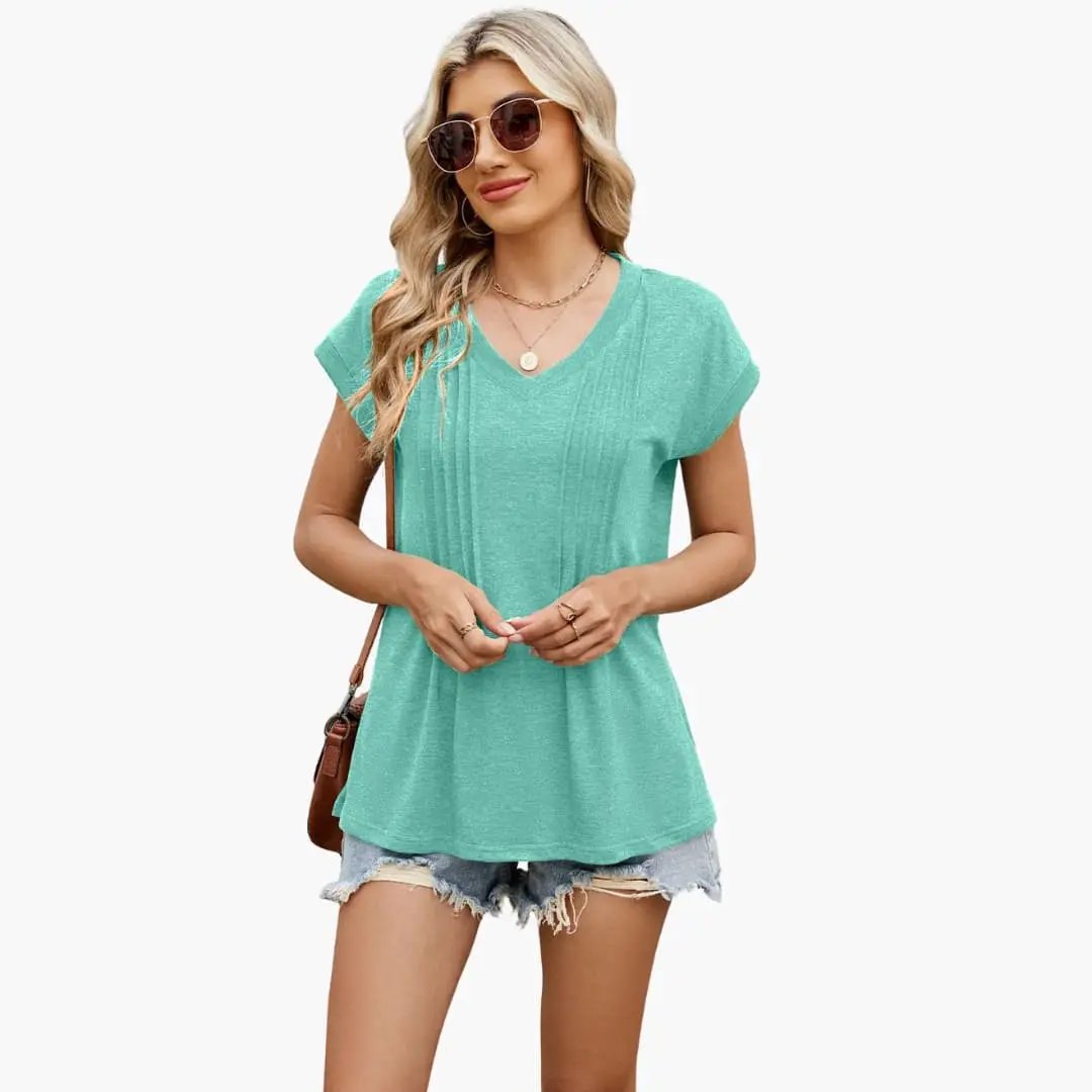 Women's V-Neck Striped Pleated Short Sleeve T-Shirt in teal, worn with denim shorts