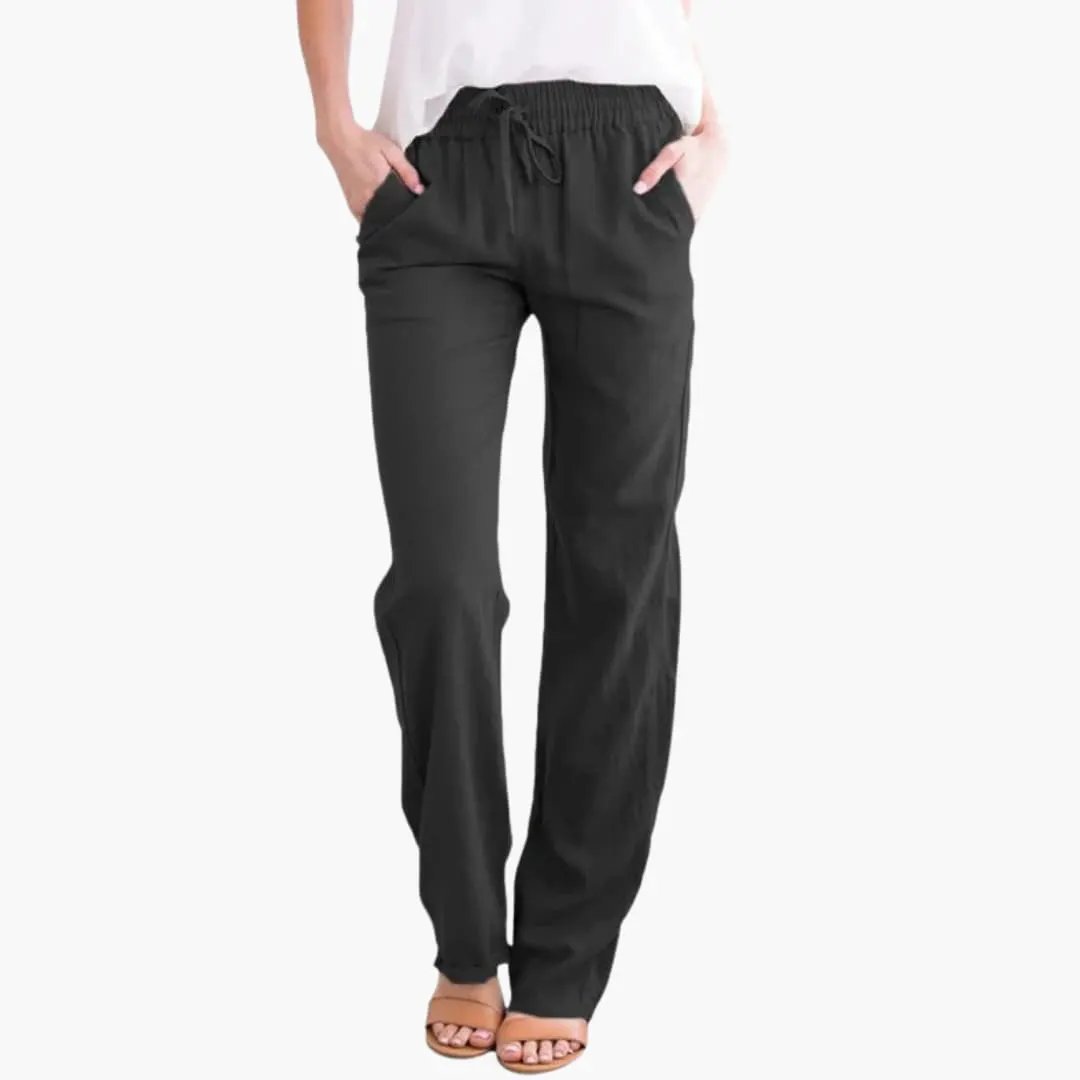 Women's wide-leg pants with elastic waist and pockets in black.