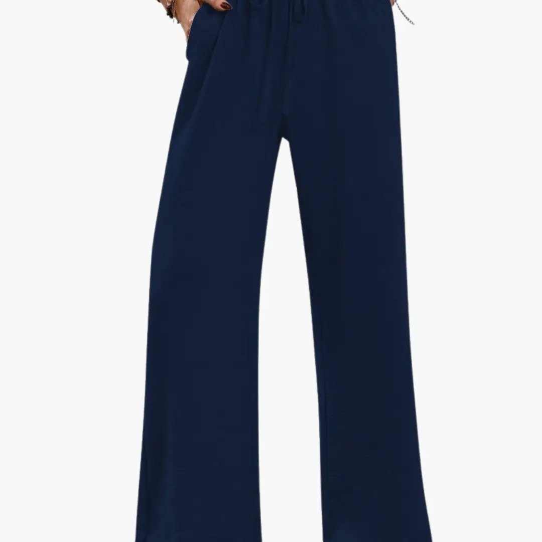 Women's wide-leg pants by Wilfred Smith in navy with elastic waistband and side pockets.