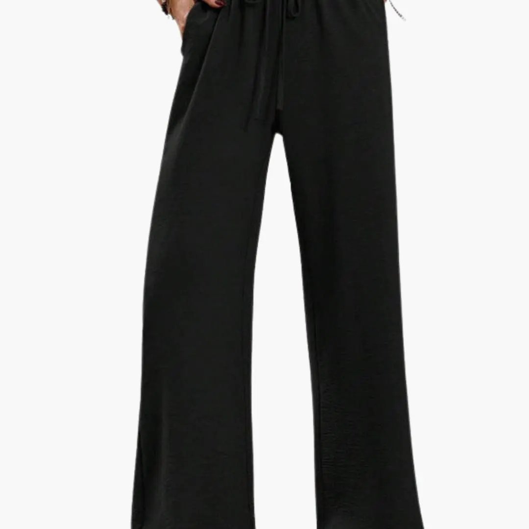 Women's pants by Wilfred Smith: black wide-leg trousers with elastic waistband and practical side pockets
