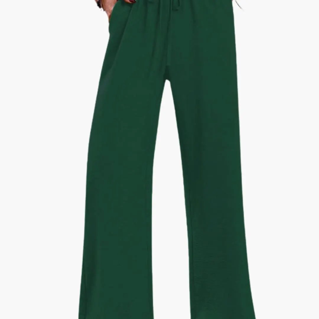 Women’s wide-leg pants in green with elastic waistband and side pockets