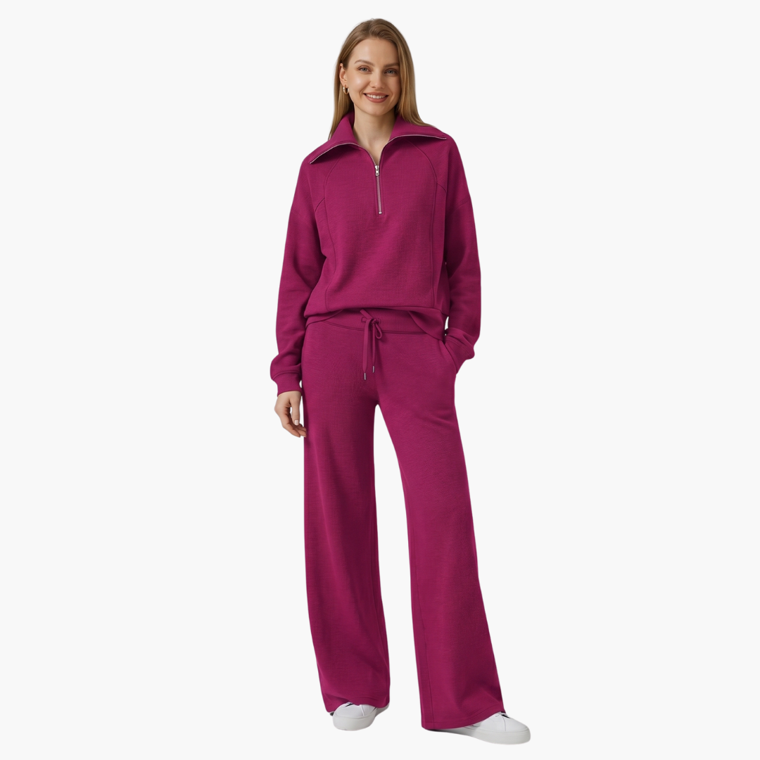 Women's two-piece loungewear set with half-zip top and wide-leg pants in magenta by Wilfred Smith