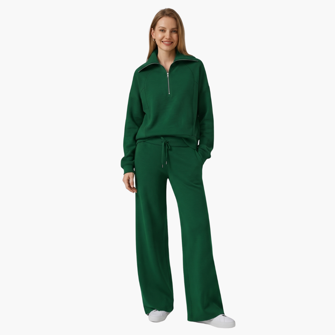 Women's lounge set with half-zip top and wide-leg pants in green, drawstring waist.
