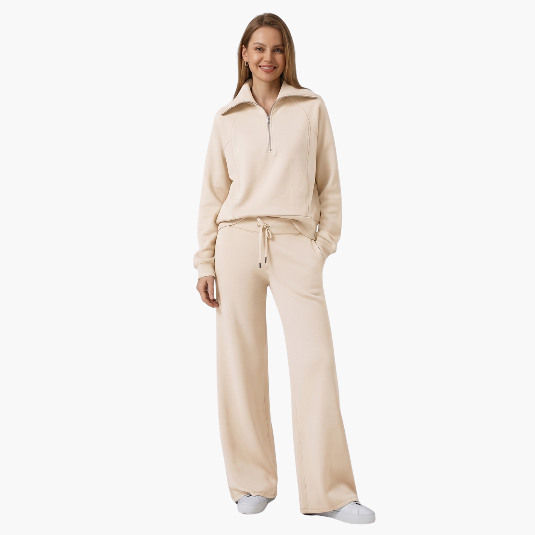 Women's lounge set by Wilfred Smith in beige, half-zip top with wide-leg pants