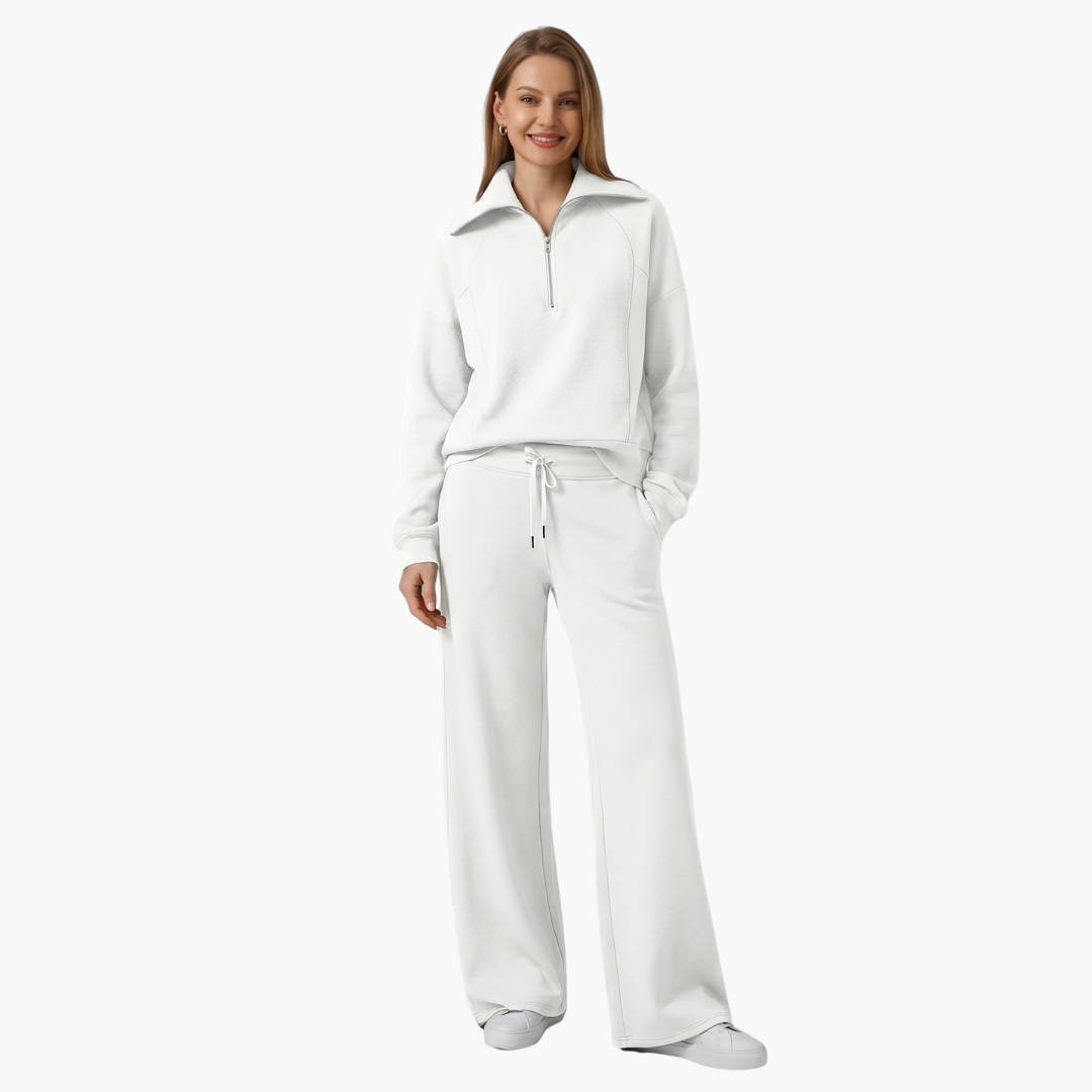 Women's lounge set with half-zip pullover and wide-leg pants in light gray by Wilfred Smith.